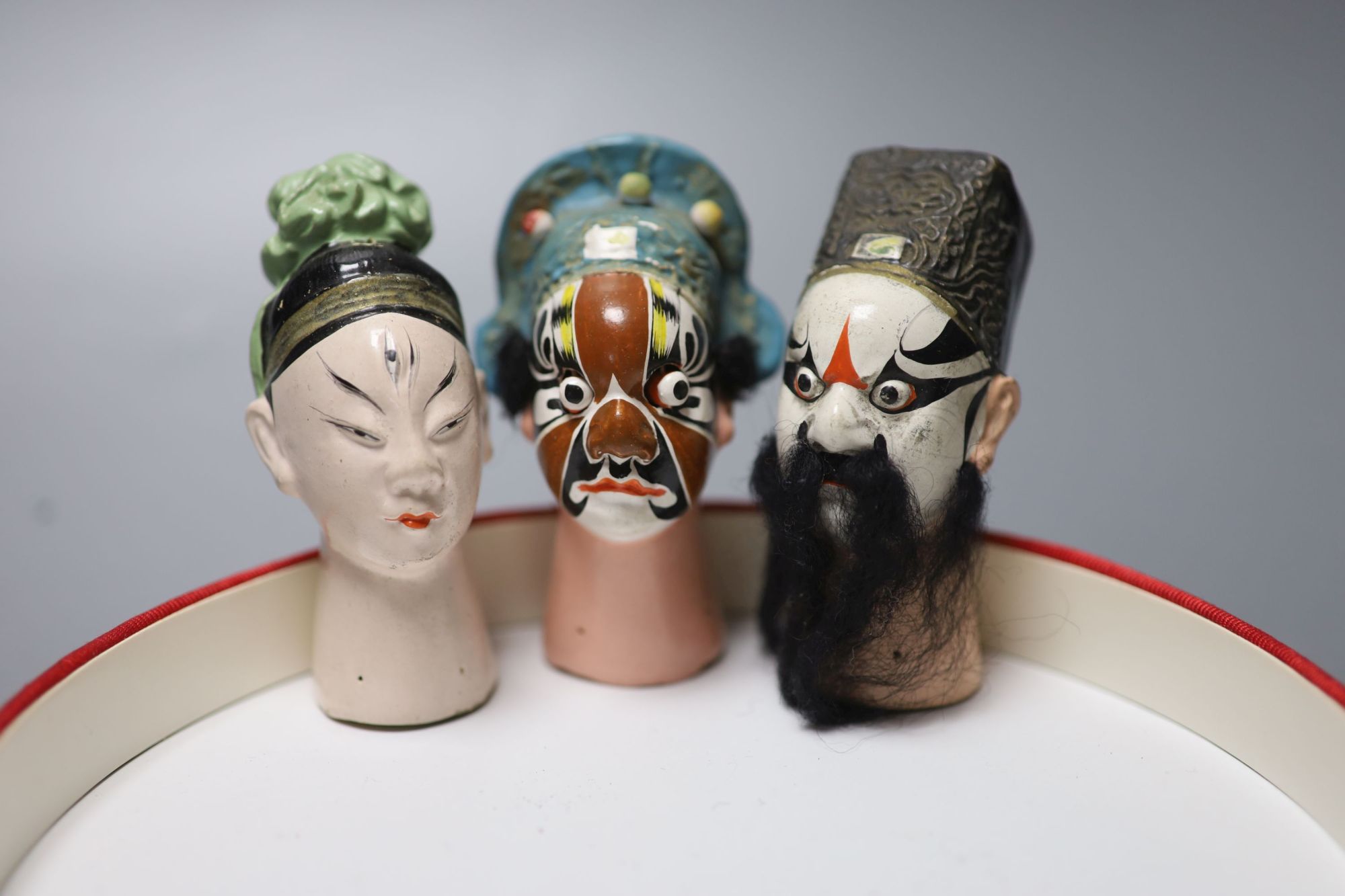 Eleven Chinese painted clay puppet heads, Fujian Province, 20th century